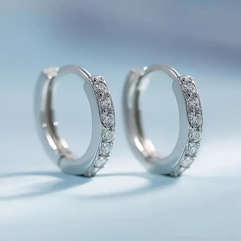 Gouden oorbellen met hangertjes in kuststijl