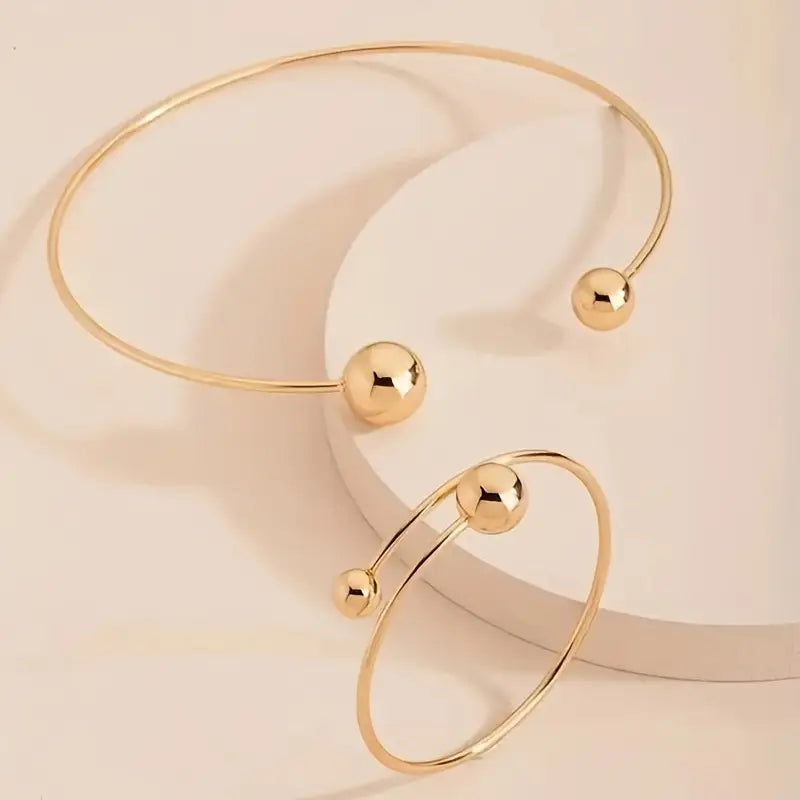 Minimalistische, lichtgevende halsband en manchetarmbandset | Goud